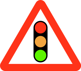 Advertencia por un semáforo.