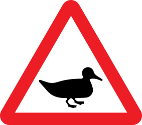 Advertencia para patos en la carretera.