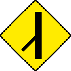 Advertencia por un cruce con una carretera lateral cerrada a la izquierda.