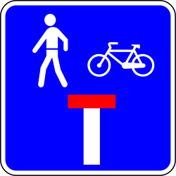 Doodlopende weg met een doorgang voor voetgangers en fietsers.