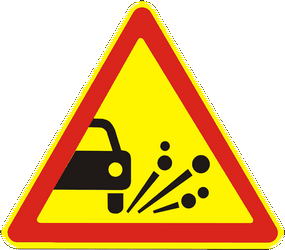 Warning for loose chippings on the road surface.