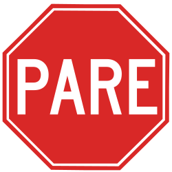 Warning for a crossroad with a sharp side road on the right.