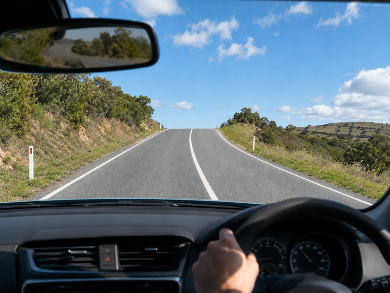 What should you do when approaching a hill crest?