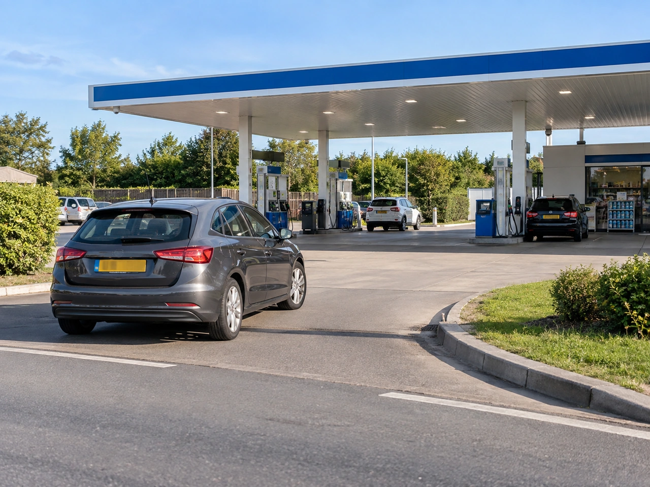 How should you position your vehicle beside a fuel pump?