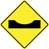 Attention, creux sur la route.