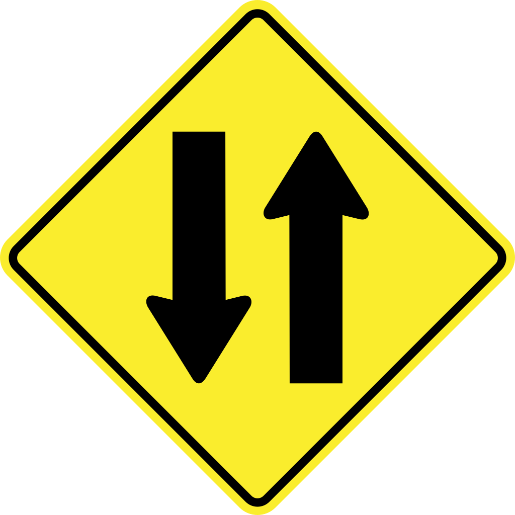 Avertissement pour une route à double sens.