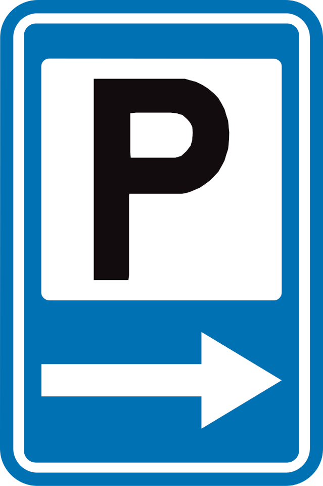 Direction d’un parking couvert.