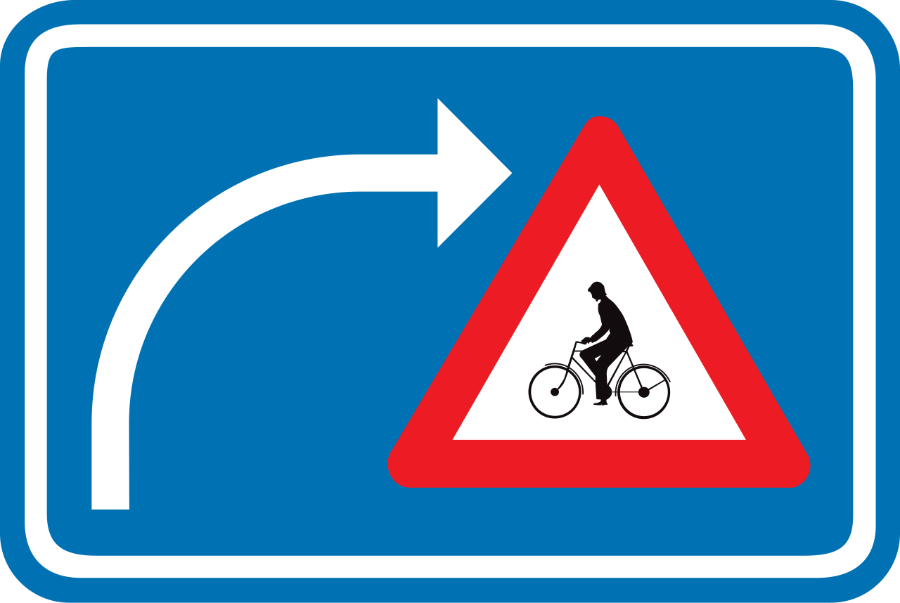 Attention aux cyclistes en tournant à droite.
