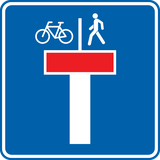Doodlopende weg met doorgang voor voetgangers en fietsers.