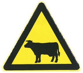 Avertissement pour bétail sur la route.