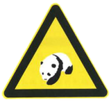 Avertissement pour pandas sur la route.