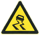 Avertissement pour une chaussée glissante.