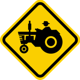 Waarschuwing voor landbouwvoertuigen.