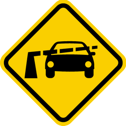Warning for a railway crossing with barriers.
