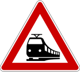 Waarschuwing voor een overweg zonder slagbomen.