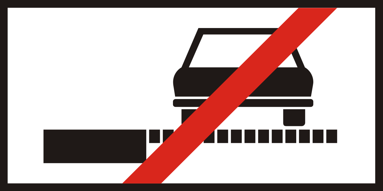 Parkeren op de berm verboden.