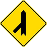 Warning for merging traffic from the left.