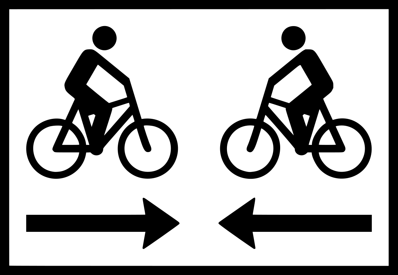 Radfahrer aus beiden Richtungen.