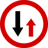 Road narrowing, give way to oncoming drivers.