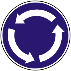 Mandatory roundabout direction.