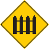 Warning for a railway crossing with barriers.